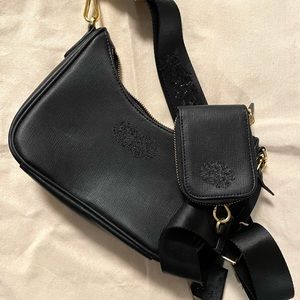 Shoulder bag with gold accents